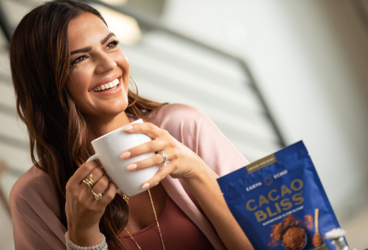 Girl drinking Cacao Bliss.